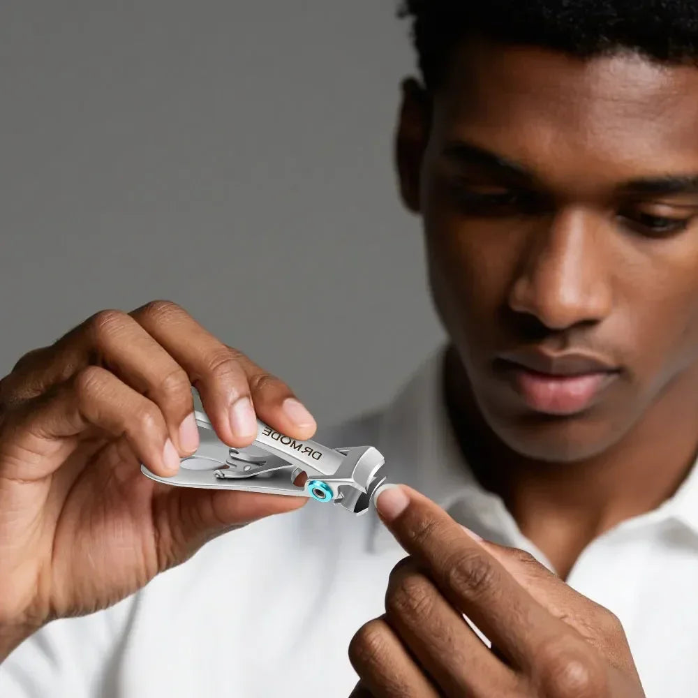 Man using precision stainless steel nail clippers for grooming fingernails